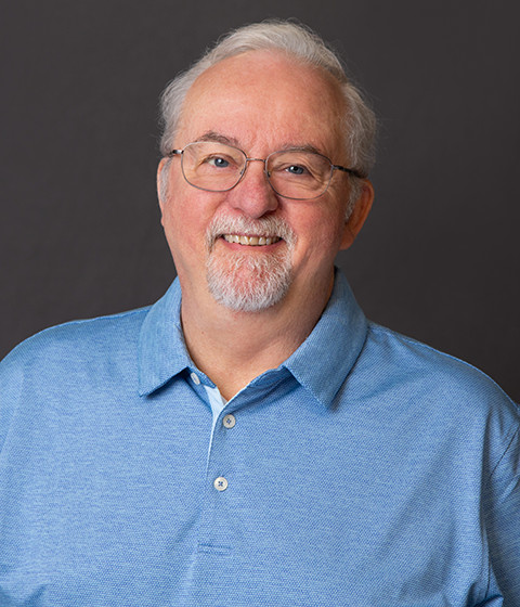 Don Suiter wearing glasses and a blue shirt