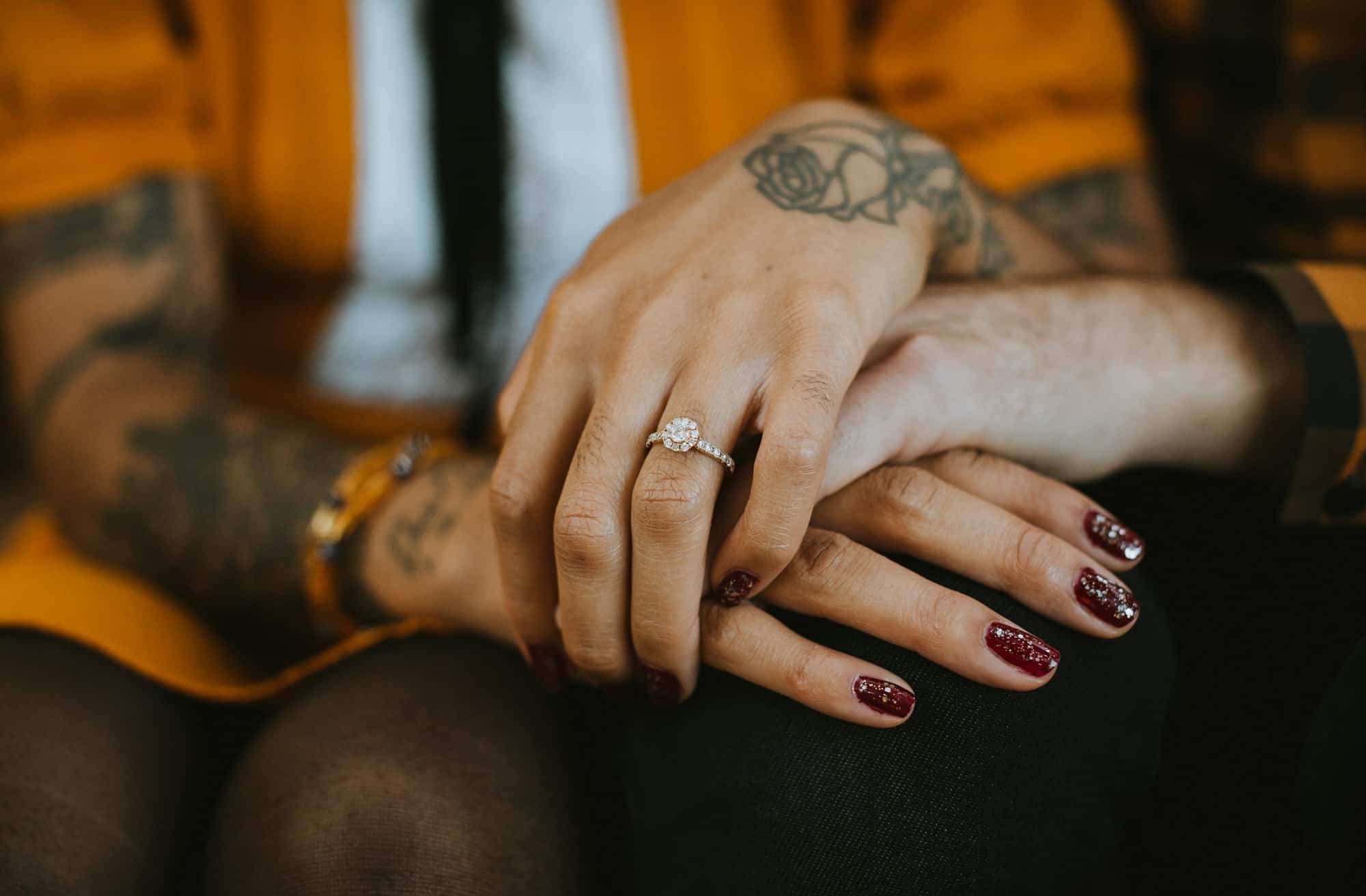 Interracial Couple's Engagement Ring and Hands